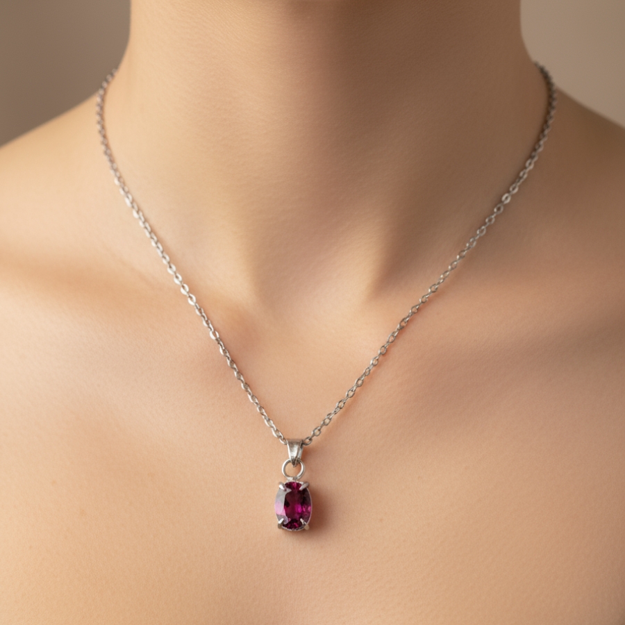 Close-up shoot of the Garnet Drop necklace